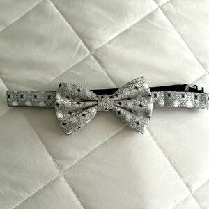 Shades if grey bow tie.